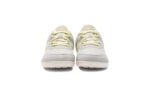 Prio youth light gray and yellow athletic shoes, front view